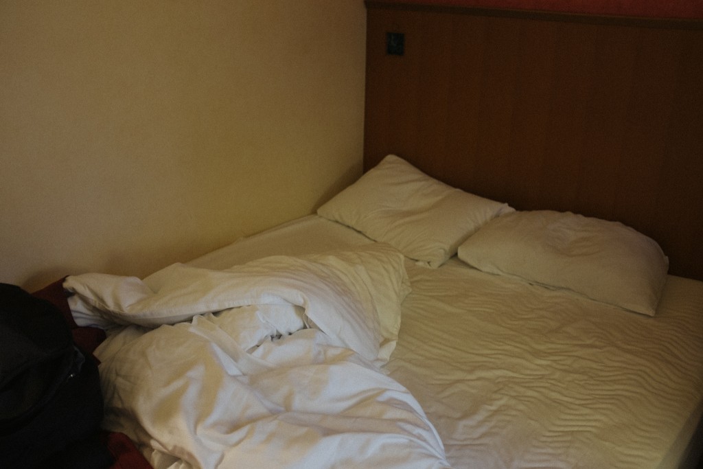 Unmade bed in Osaka.